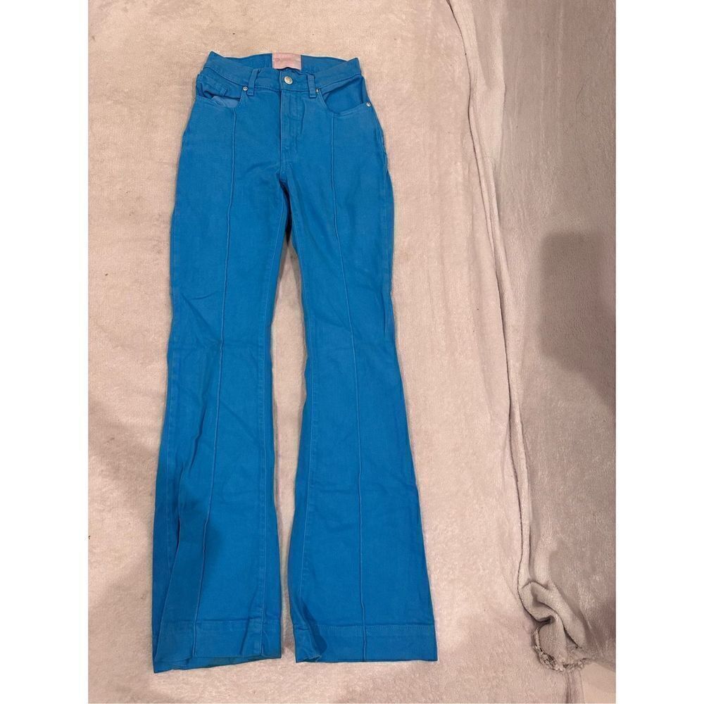 REVICE denim blue jeans size 24 with huge star on the back